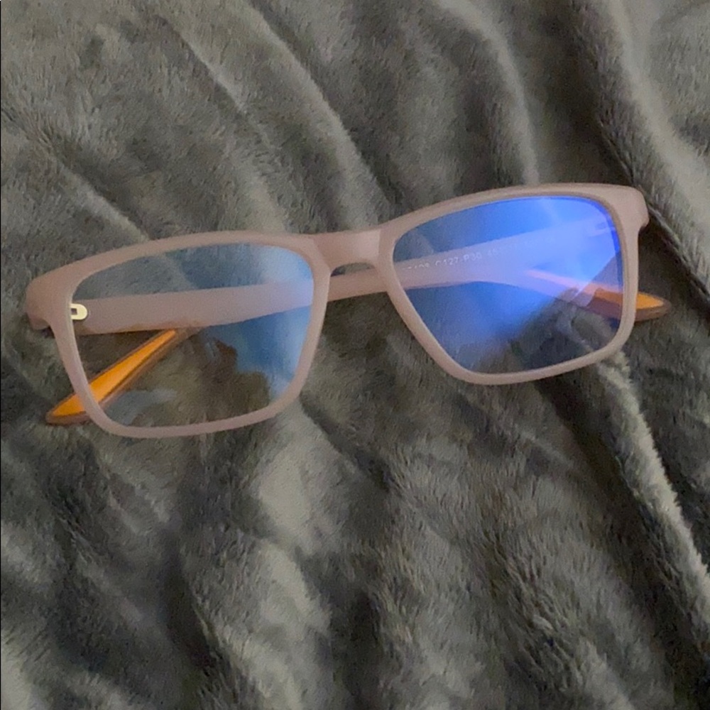 Brand new. Light pink glasses for blue light.